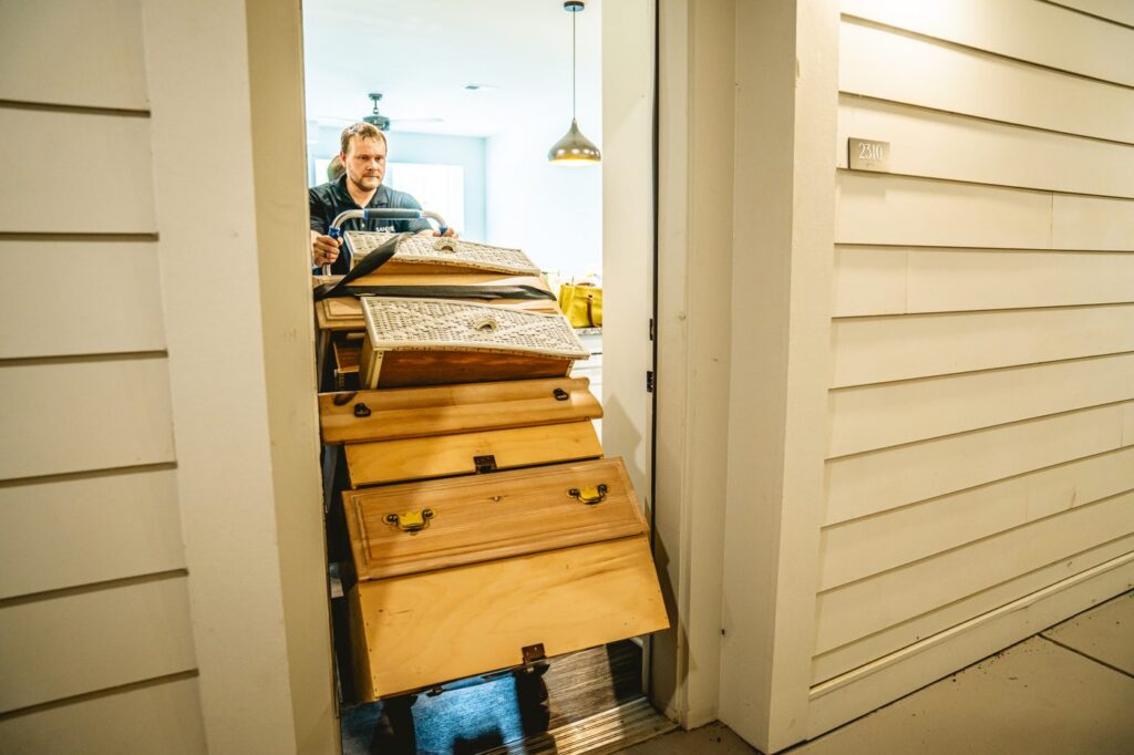LiftKar SAL Pro bringing a dresser through a doorway